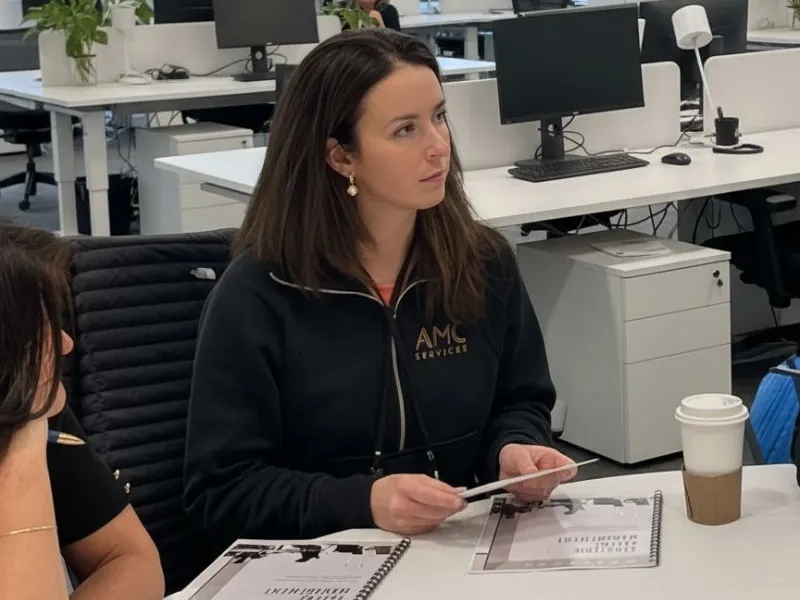 Agnes Watkinson working through findings with a client team